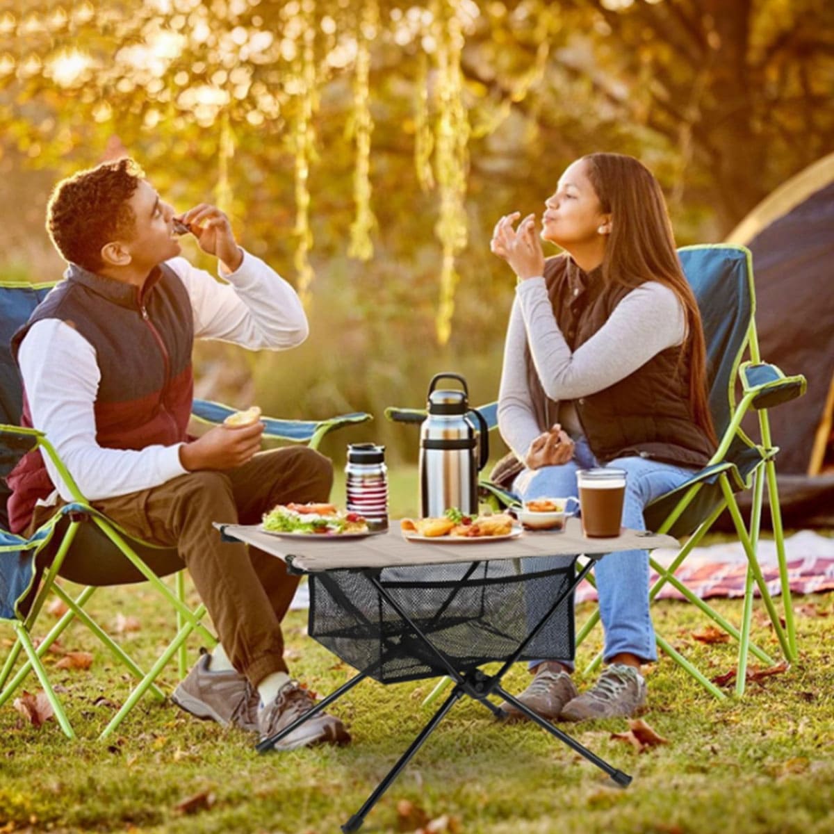 Portable folding table with cloth cover