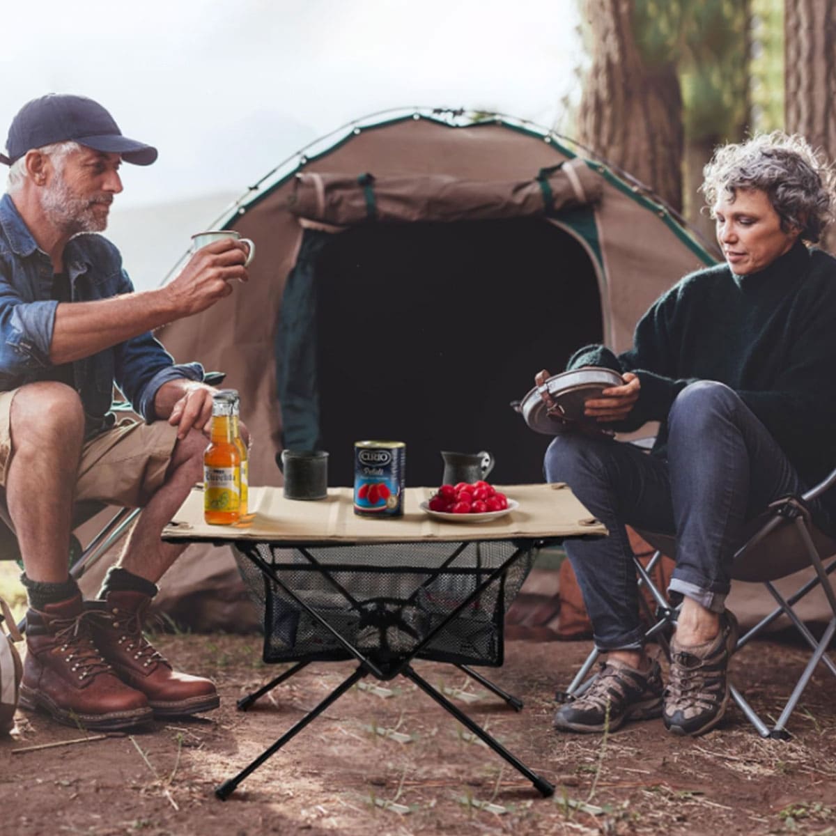 Portable folding table with cloth cover